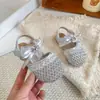 Sandalias de Diadema de Punto Hueco para Niñas 2026 Nuevo Verano Bebé Encaje Lazo Zapatos de Princesa Dulces Zapatos Individuales