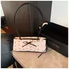 Bolso Satchel de Verano Rosa Súper Caliente con Lazo Bolso Almohada Bolso de Mujer 2025 Nuevo Bolso Cruzado de Alta Gama Estilo Ballet