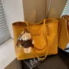 Coleção de verão 2026 transfronteiriça: Bolsa de ombro feminina moderna de grande capacidade, bolsa de praia para viagem e bolsa tote estilosa para o dia a dia