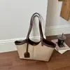 Bolsa de ombro com estampa de leopardo para mulheres, novo modelo outono 2026, nicho e super popular, bolsa de ombro executiva requintada, bolsa tote de grande capacidade