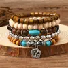 Amazon venta caliente transfronteriza pulsera de cuentas hecha a mano estilo retro para hombre pulsera de línea elástica multicapa con cuentas de madera árbol de la vida