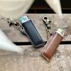 En stock estilo retro accesorios de encendedor de un yuan funda de cuero para colgar en la cintura funda protectora para encendedor accesorios de llavero portátiles