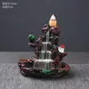 Quemador de incienso de reflujo de agua de alta montaña transfronterizo quemador de incienso de cerámica observador de humo fuente de rocalla adornos creativos de camino de incienso granos de incienso