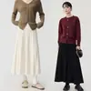 Ropa de maternidad para otoño e invierno 2026, nueva falda de punto de longitud media, adelgazante casual, falda plisada suelta de línea A para mujeres petite