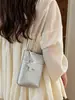 Bolsa Pequena Texturizada Lisa Estilosa para Mulheres Verão 2026 Nova Simples Casual Bolsa para Celular Moda Coreana Bolsa Transversal
