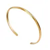 Pulsera de Acero Inoxidable Brillante Tohm Moda Europea y Americana Popular Transfronteriza Pulsera Abierta en Forma de C Chapada en Oro Real de Acero de Titanio para Mujer