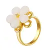 Anel Feminino Elegante Estilo Chanel Flor de Cinco Folhas, Novo Modelo Transfronteiriço com Pedra Olho de Gato Giratória, Joia de Design Exquisito