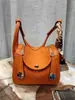 Bolsas de medicina al por mayor bolsas para mujer cuero de capa superior con textura de lichi bolsa de enfermera hombro portátil bolsa Lindi bolsa almohada Europa y Estados Unidos
