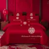 Juego de ropa de cama de lujo estilo chino, hecho de algodón 100% de fibra larga, un juego de cuatro piezas que incluye una sábana y una funda de edredón de algodón puro rojo, perfecto para la alcoba de una recién casada.