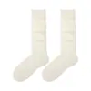 Nuevos calcetines de becerro lisos de color sólido de doble costura transfronterizos para otoño e invierno, calcetines casuales versátiles apilables, calcetines de tubo medio para mujer, calcetines blancos para estudiantes