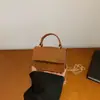 Bolsa mini quadrada versátil com corrente acoplada para mulheres, bolsa transversal de nicho de alta qualidade, nova moda primavera