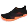 Zapatos de natación para playa transfronterizos, zapatos para vadear al aire libre, calcetines, zapatos para hombres y mujeres, zapatos para vadear en parques acuáticos, playa antideslizantes, amigables con la piel, negro-naranja