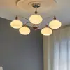 Estilo Bauhaus Crema Vintage Lámpara de Araña para Sala de Estar Diseñador Madera Maciza Creativo Vidrio de Caqui Lámpara de Araña de Hierro para Comedor Dormitorio