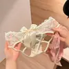 Bragas de mujer sexys tipo triángulo, con diseño hueco de nalgas hermosas estilo abstinencia, para mujeres, con lazo, sutilmente seductoras