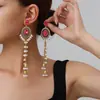 Pendientes étnicos de talla europea y americana más vendidos, pendientes largos ovalados en forma de lágrima, estilo étnico elaborado y creativo con incrustaciones de diamantes de alta gama