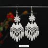 Brincos de borla de prata Miao artesanais estilo étnico vintage temperamento feminino Yunnan Miao personalidade estágio brincos longos versáteis