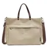 Bolsa de Ombro 2025 Primavera Novo Estilo Simples e Fashion Tote Bag para Mulheres Transversal Grande Capacidade Portátil Tendência Tote Bag