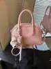 Bolso de Mano Minimalista Boston 2026 Modelo Nuevo Bolso de Bowling de Gama Alta Versátil de Nicho Bolso Cuadrado Pequeño Bolso Cruzado