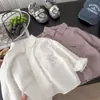 Nueva colección primavera 2026: tops elegantes y versátiles de algodón para capa interior y exterior para hombres, mujeres y niños