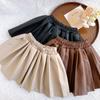 Saia Infantil 2024 Outono/Inverno Novo Estilo Menina Couro PU Saia Cor Sólida Forrada com Lã Saia Plissada Versátil Estilo Coreano
