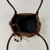Bolso tote pequeño retro translúcido transfronterizo con charm dulce, bolso cruzado para mujer, bolso cuadrado pequeño de mano casual, bolso de hombro