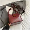 Bolso Pequeño Retro Casual para Mujer 2025 Otoño Nuevo de Moda para Salir Bolso de Mano Popular Bolso de Hombro Único Cruzado Bolso Cubo