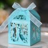 Caja de dulces de boda calada para el Día de San Valentín transfronterizo, caja de dulces azul con mariposa para boda, fábrica de Shenzhen en stock