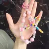 Nueva Cadena de Teléfono Móvil de Cuentas Pintada a Mano Linda de Dibujos Animados Moda Estudiante Llavero DIY Colgante de Bolso con Lazo