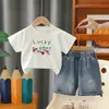 Conjunto de Verano para Niños 2026 Estilo Nuevo Ropa de Verano para Niños Pequeños Conjunto de Dos Piezas con Cuello Redondo y Manga Corta Ropa de Moda para Niños