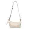 Bolsa de Ombro de Couro Macio com Design de Nicho Novo Verão 2025 Bolsa Transversal de Cor Pura de Alta Qualidade Estilo Estrangeiro Bolsa Dumpling Bolsa Feminina