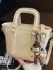 Bolso de Mano para Mujer Moderno y Sencillo 2026 Primavera Nuevo de Moda Elegante Color Sólido Bolso Cruzado Tipo Cubo