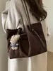 Bolsa de Ombro Grande Capacidade Retro Outono e Inverno 2025 Transfronteiriça Bolsa Tote Moda Tendência Camurça de Alto Padrão Versátil