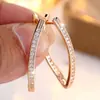 Pendientes Asimétricos en Forma de V Dorados Champagne de Moda Populares en Aliexpress con Microincrustaciones de Diamante Blanco Pendientes Exquisitos Versátiles Europeos y Americanos