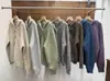 Novos estilos de outono e inverno do Japão e da Coreia: suéteres macios, de caimento solto e com capuz, peças de vestuário externas femininas e blusas de tricô de manga longa com estilo relaxado e casual e botões em formato de chifre