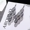 ¡Guau!Moda Transfronteriza Europea y Americana, Varios Pendientes Largos Metálicos de Borla Exagerada de Estilo Moderno con Elementos Elegantes