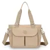Bolso de mujer tendencia transfronteriza, bolso de hombro para mamá, nuevo modelo 2026, tela de nailon ligera, bolso de tela de color liso, bolso de mano cruzado