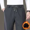 Pantalones casuales nuevos para hombre para exportación, otoño e invierno 2026, pierna recta, cintura elástica, corte holgado, pantalones deportivos