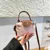 Bolsa de Jeans Trendy Estilo Bolinho Transfronteiriça para Mulheres 2025 Novo Estilo Nicho Francês Bolsa de Ombro Transversal Bolsa de Mão Porta-Moedas