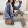 Cardigã de tricô vintage estilo coreano para mulheres, novo modelo primavera e outono 2026, de abotoamento simples, cor sólida, gola V, cardigã de corte solto com bolsos