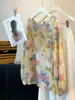Camisa floral de manga longa estilo coreano para mulheres, novo design de verão, proteção solar, caimento solto, versátil, fina, manga sino, top de gola redonda