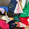 Bolsa de Lona Fina Simples com Letra Vintage Francesa Bolsa de Tecido para Estudante e Comutador Bolsa de Algodão Colorida