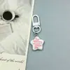 Chaveiro de Biscoito Estrela com Calda Colorida Desenho Animado Fofo Brinquedo de Comida Simulado Pingente de Bolsa Presente para Casais e Melhores Amigos