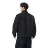 Chaqueta de mezclilla estilo americano con cuello mao y tapeta diagonal para hombre, marca de moda, corte holgado, prenda exterior casual y elegante para primavera y otoño