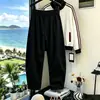2026 Nuevos Pantalones de Pana de Pierna Ancha para Hombre Patrón de Espiga de Terciopelo de Algodón Europeo Pantalones Relajados tipo Guadaña Pantalones de Pierna Recta de Color Sólido para Hombre