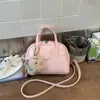 Bolsa Boston Feminina 2025 Nova Primavera e Verão Tendência Moda Simples Bolsa de Ombro Crossbody Bolsa Almofada