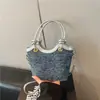 Bolsa pequena estilo transfronteiriço para mulheres, nova coleção primavera 2026, bolsa de ombro versátil, bolsa de axila e bolsa tipo balde crossbody
