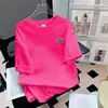 Camiseta de algodón puro suelta de manga corta para mujer, nuevo diseño simple, top de verano 2026, camiseta suelta al por mayor