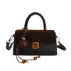 Bolso Cuadrado Pequeño de Mano de Nicho Simple 2025 Otoño e Invierno Nuevo Estilo Coreano Bolso de Hombro Casual de Moda Bolso Cruzado de Gama Alta