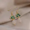 Pendientes de Borla con Cuentas de Cristal de Flor de Loto Goteando Aceite Nuevo Chinoiserie Lujo Accesible Pendientes de Gancho para Oreja de Nicho Pendientes Elegantes de Gama Alta para Mujer