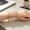 Pulsera de acero inoxidable europea y americana de venta caliente, versátil y moderna, no se decolora, con sentido de alta gama, incrustaciones de diamantes, moda simple, pulsera de acero de titanio